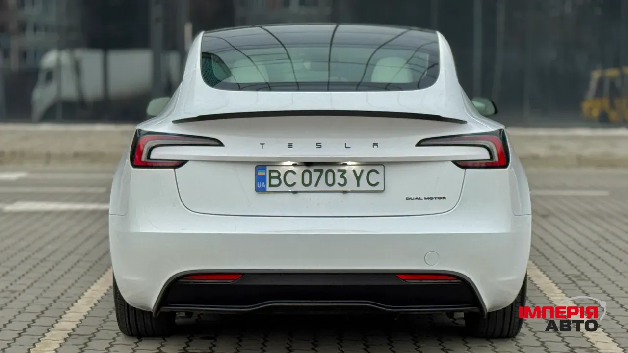 Tesla Model 3 - фото 7