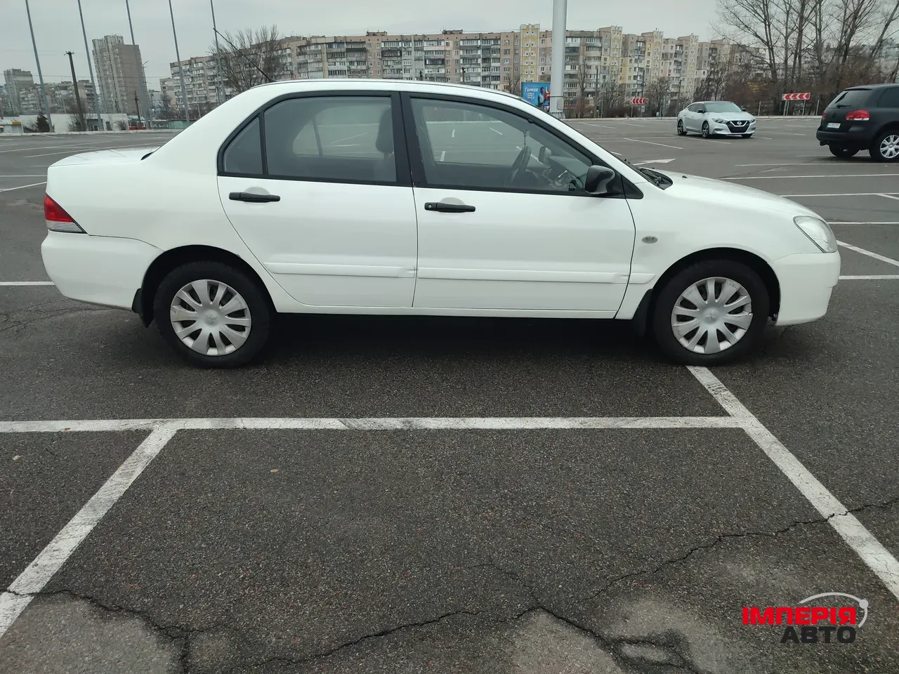 Mitsubishi Lancer - фото 2