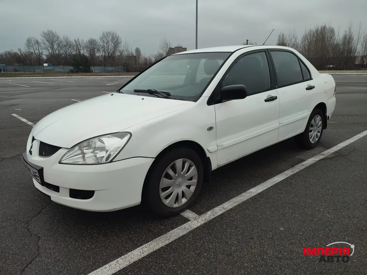 Mitsubishi Lancer - фото 6