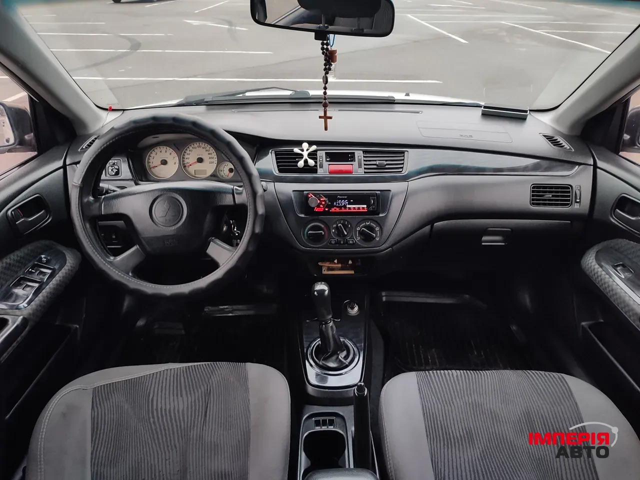 Mitsubishi Lancer - фото 13
