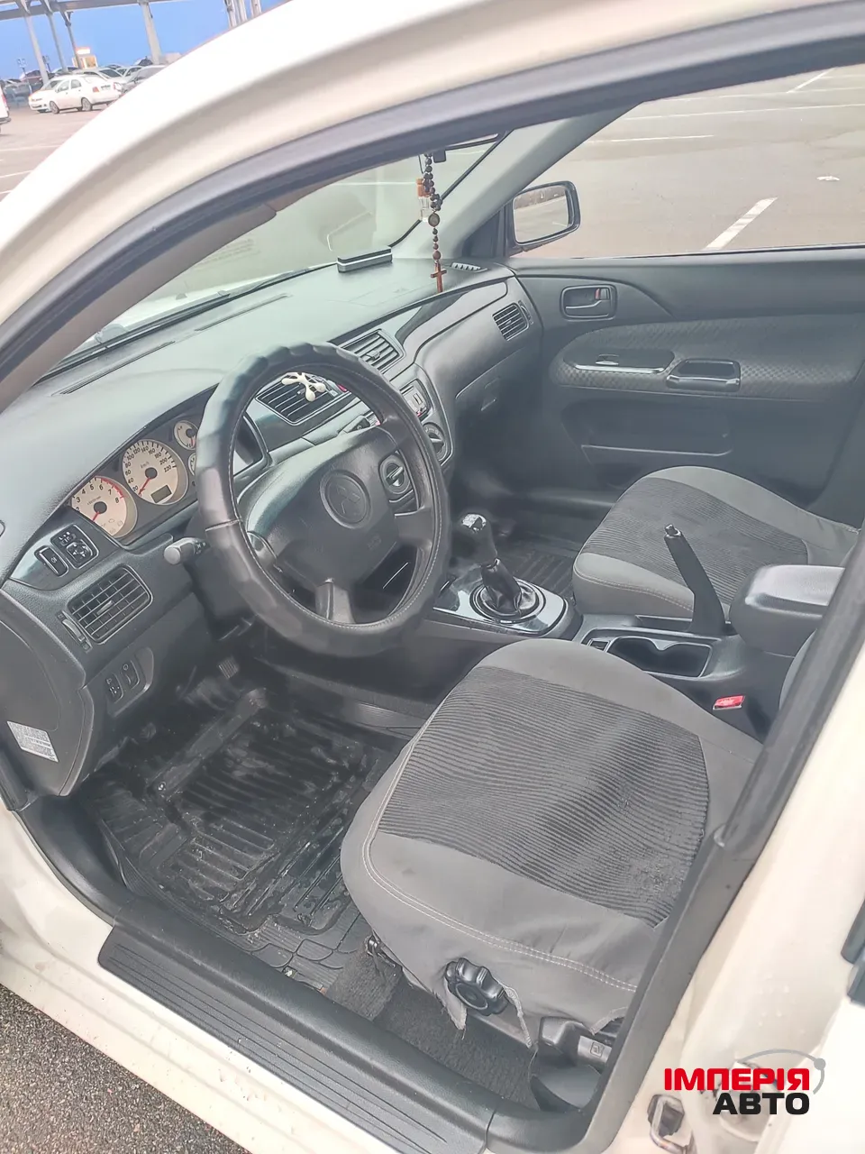 Mitsubishi Lancer - фото 14