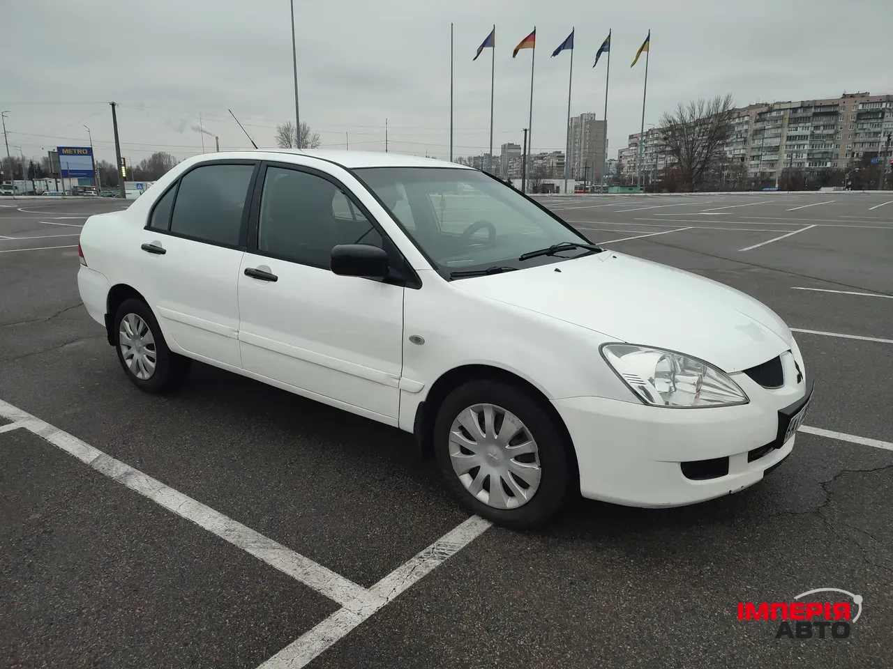 Mitsubishi Lancer - фото 1
