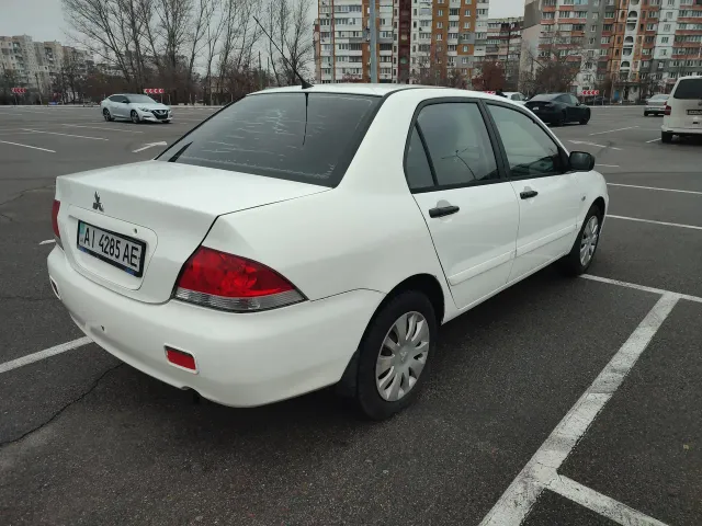 Mitsubishi Lancer - фото 3