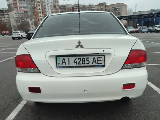 Mitsubishi Lancer - фото 4