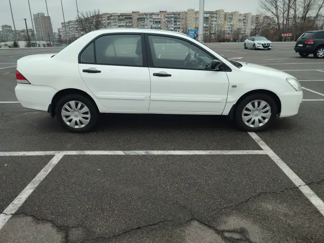 Mitsubishi Lancer - фото 2