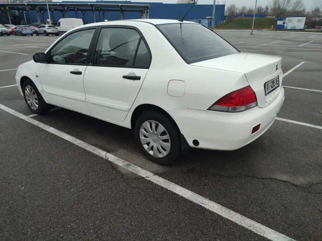 Mitsubishi Lancer - фото 5