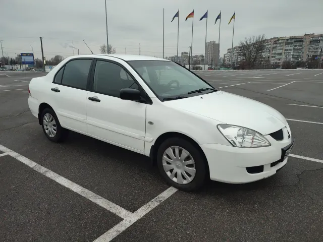 Mitsubishi Lancer - фото 1