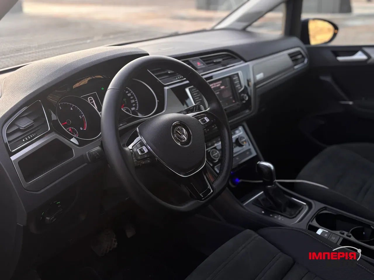 Volkswagen Touran - фото 15