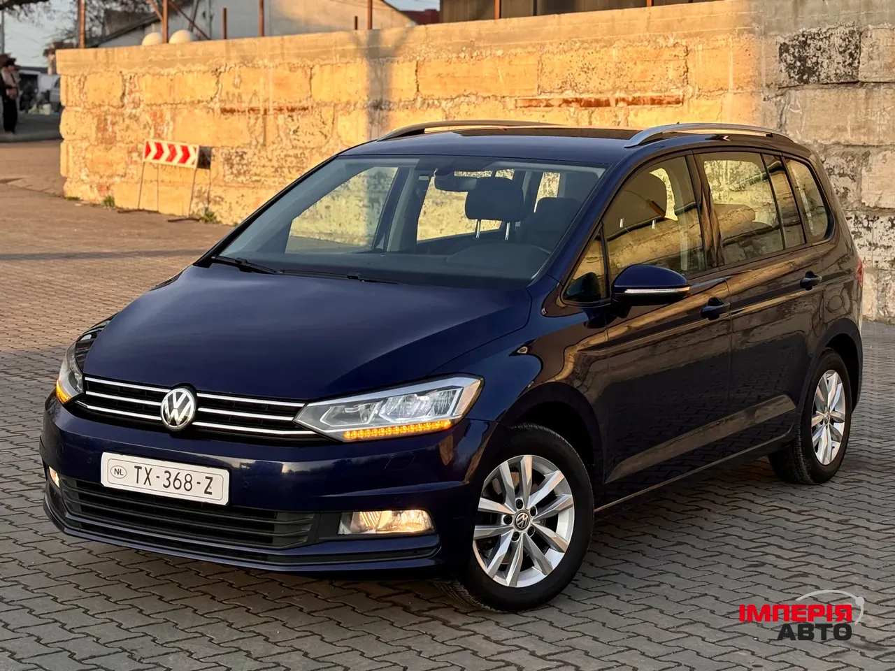 Volkswagen Touran - фото 11