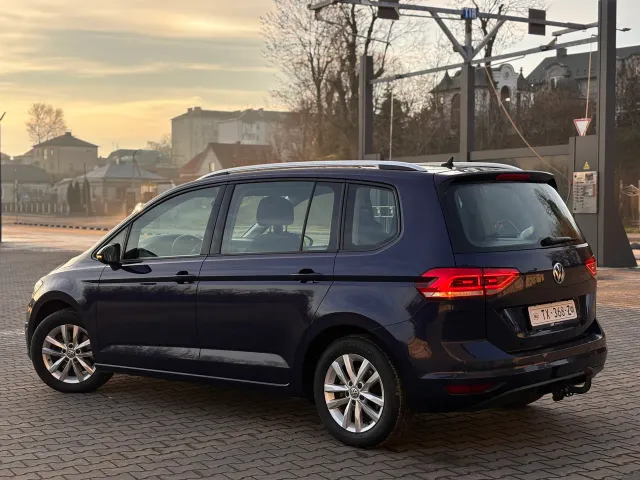 Volkswagen Touran - фото 5