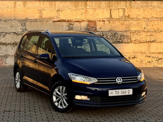 Volkswagen Touran - фото 4