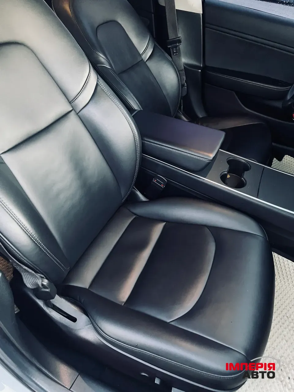 Tesla Model 3 - фото 12