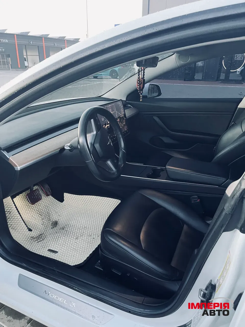 Tesla Model 3 - фото 18