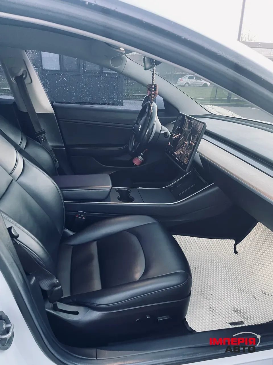 Tesla Model 3 - фото 11