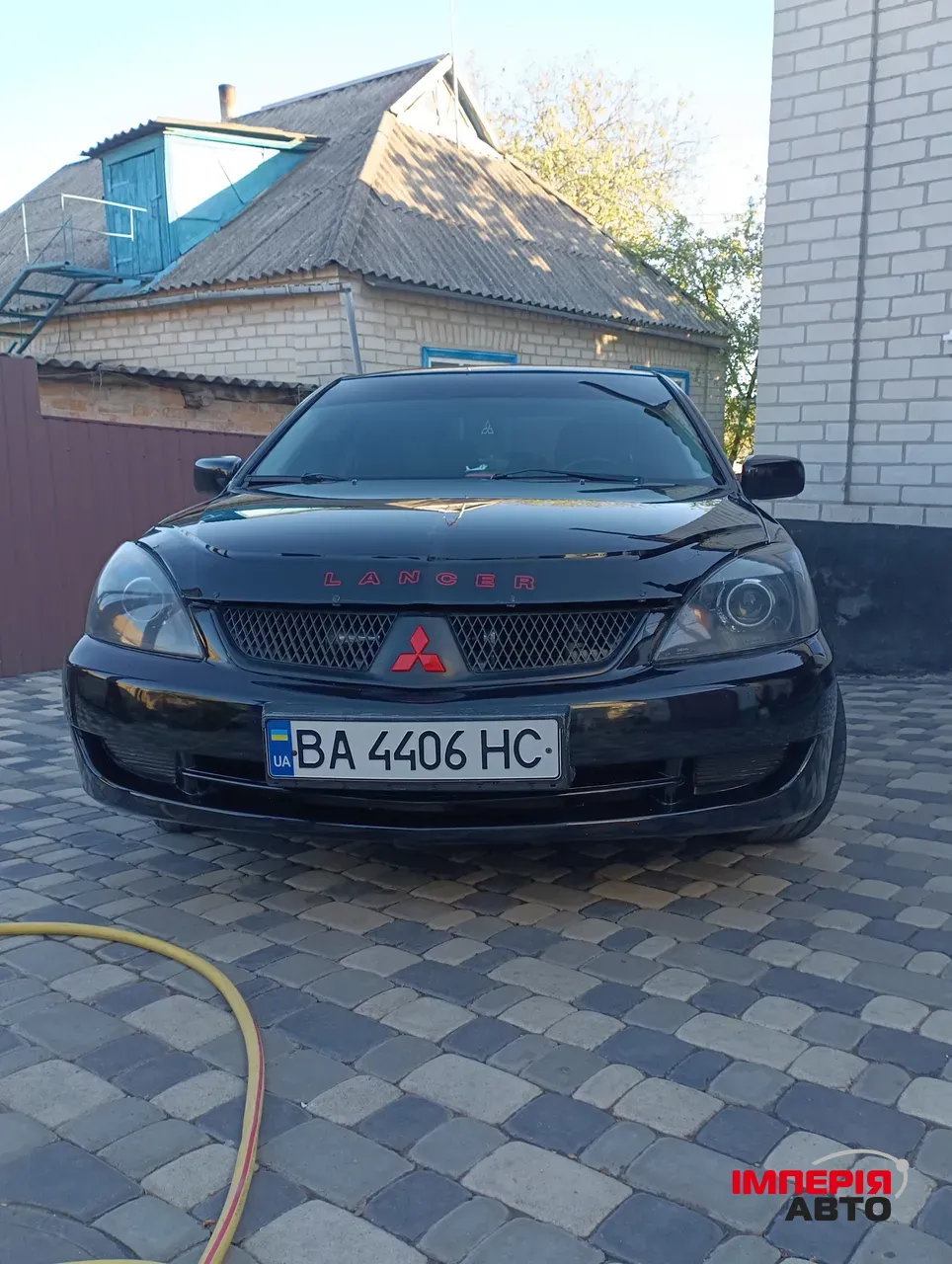 Mitsubishi Lancer - фото 3