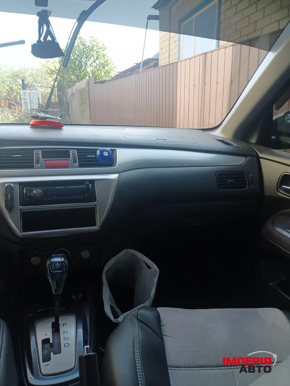 Mitsubishi Lancer - фото 8