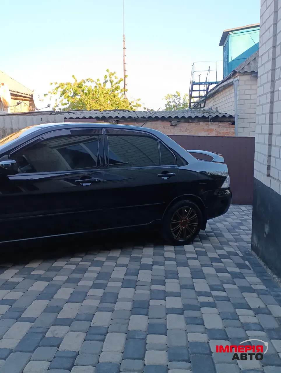 Mitsubishi Lancer - фото 2