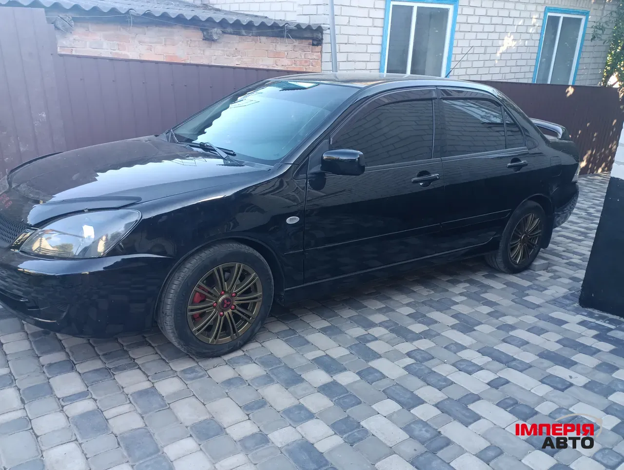 Mitsubishi Lancer - фото 11