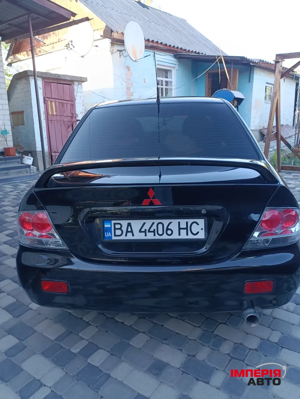 Mitsubishi Lancer - фото 4