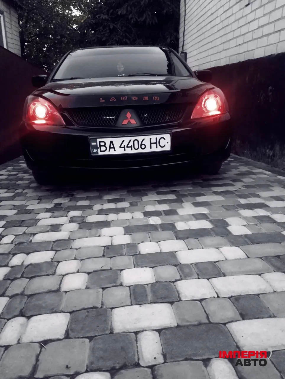 Mitsubishi Lancer - фото 1