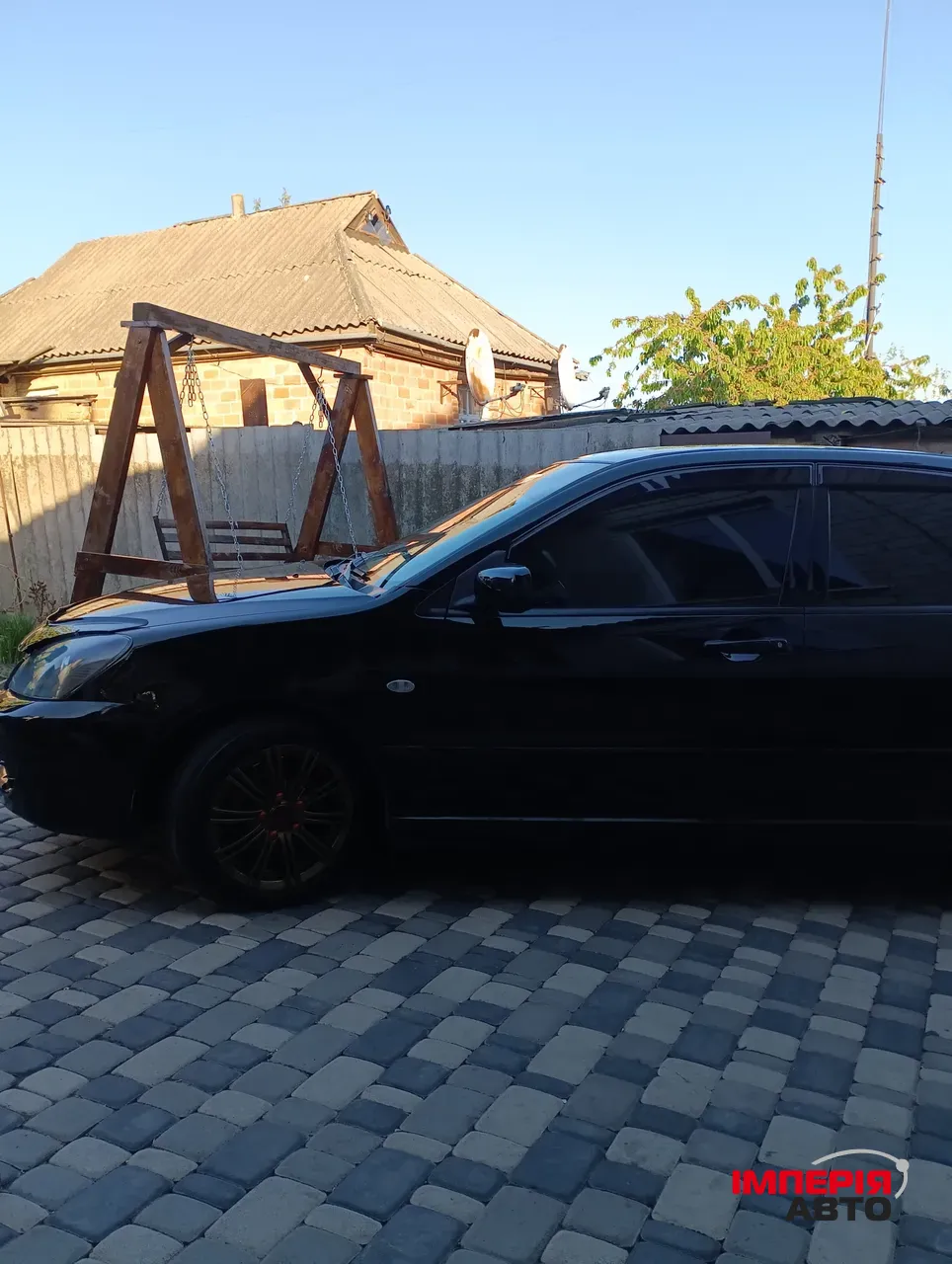 Mitsubishi Lancer - фото 5