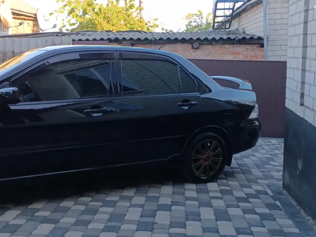 Mitsubishi Lancer - фото 2