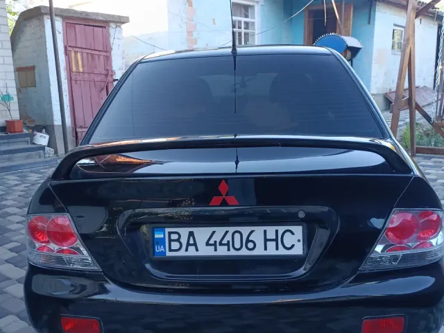 Mitsubishi Lancer - фото 4