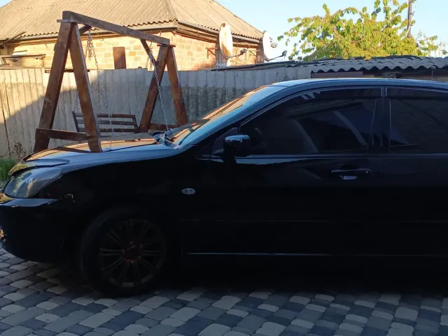 Mitsubishi Lancer - фото 5