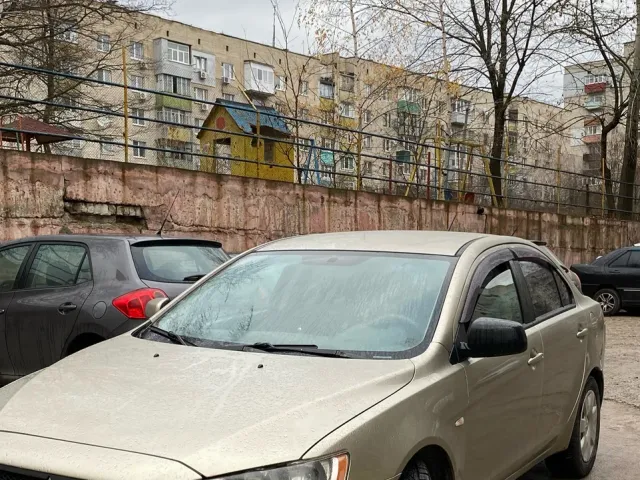 Mitsubishi Lancer - фото 1
