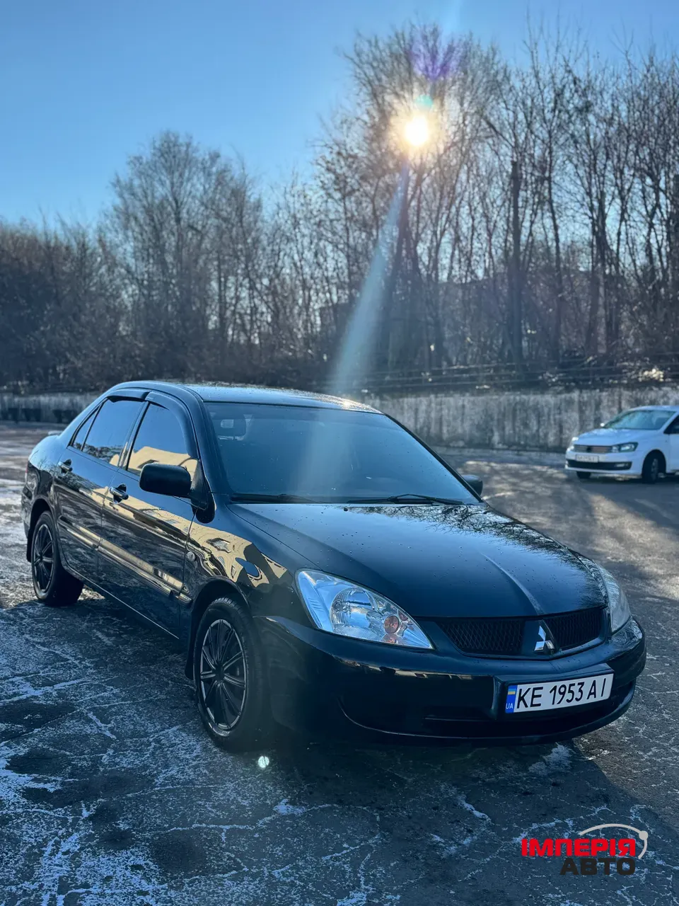 Mitsubishi Lancer - фото 1