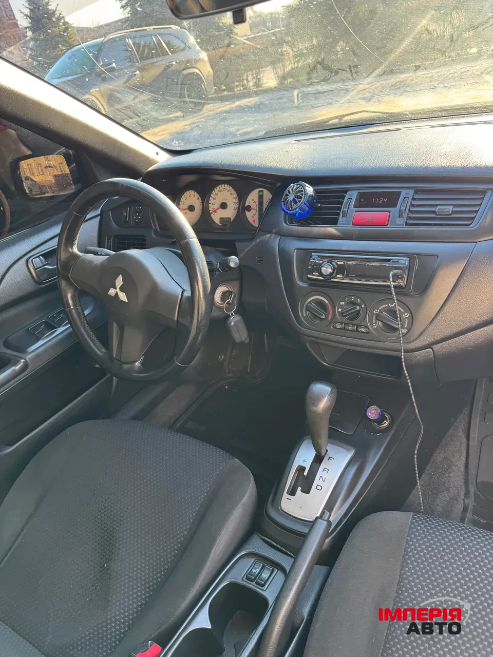 Mitsubishi Lancer - фото 9