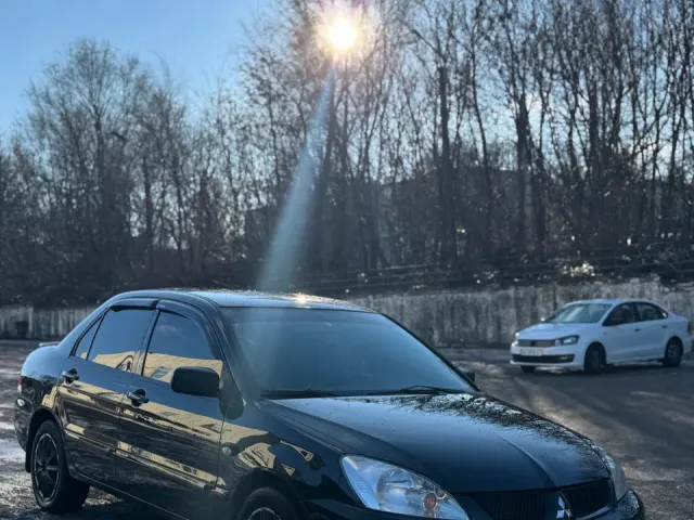 Mitsubishi Lancer - фото 2