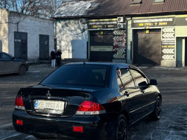 Mitsubishi Lancer - фото 3