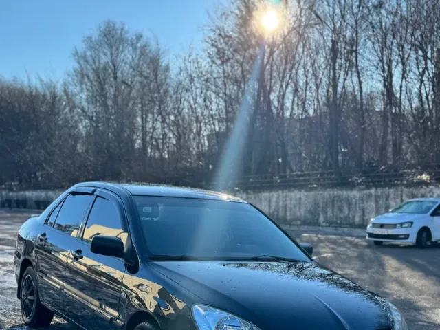 Mitsubishi Lancer - фото 1