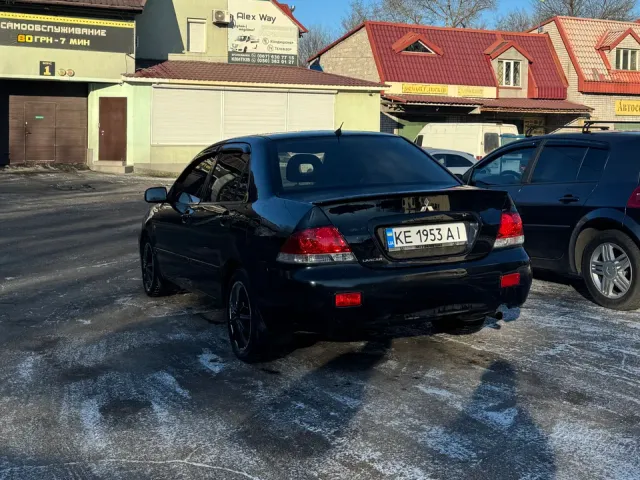 Mitsubishi Lancer - фото 4