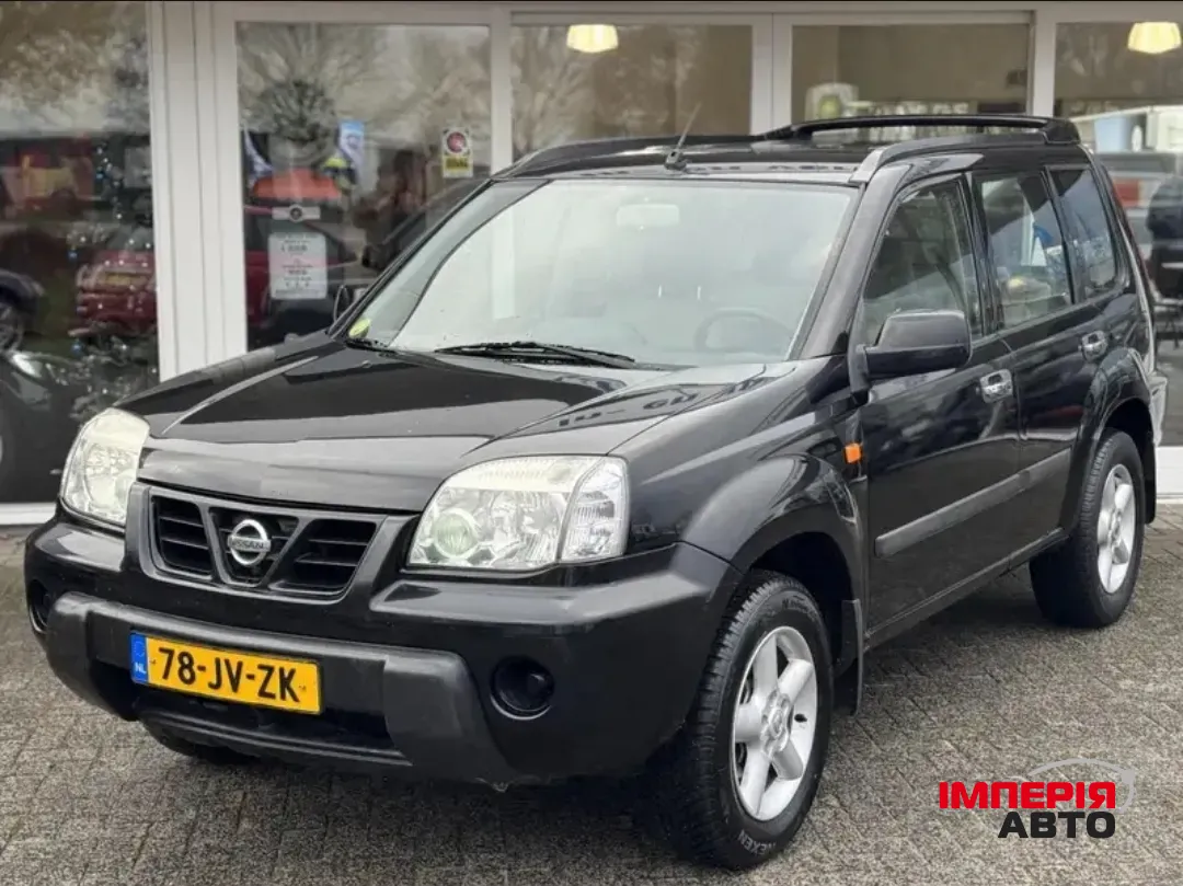 Nissan X-Trail - фото 1