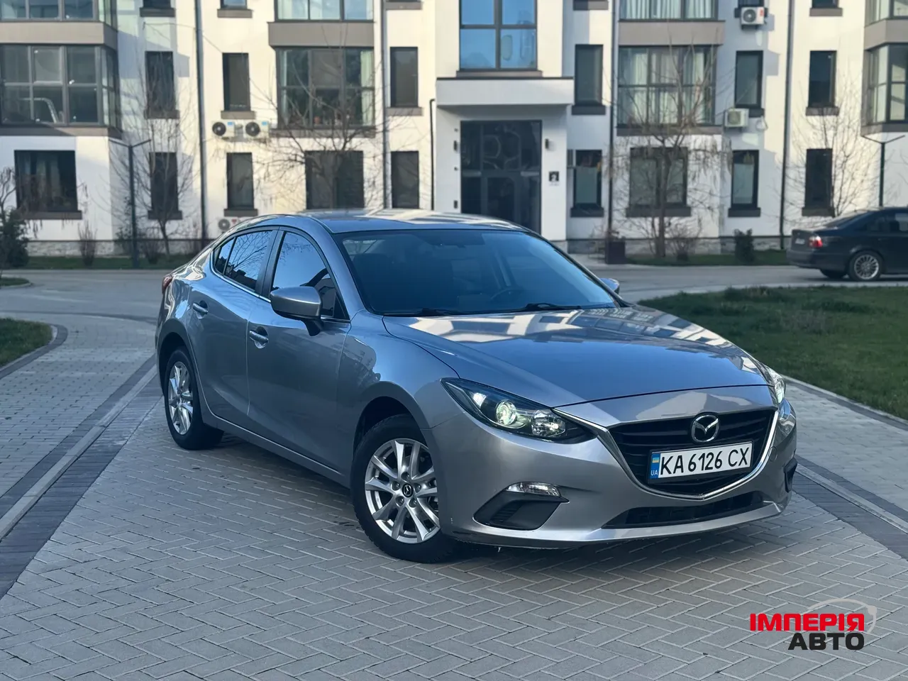 Mazda 3 - фото 1