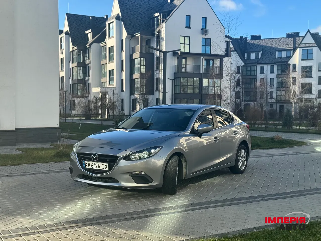 Mazda 3 - фото 7