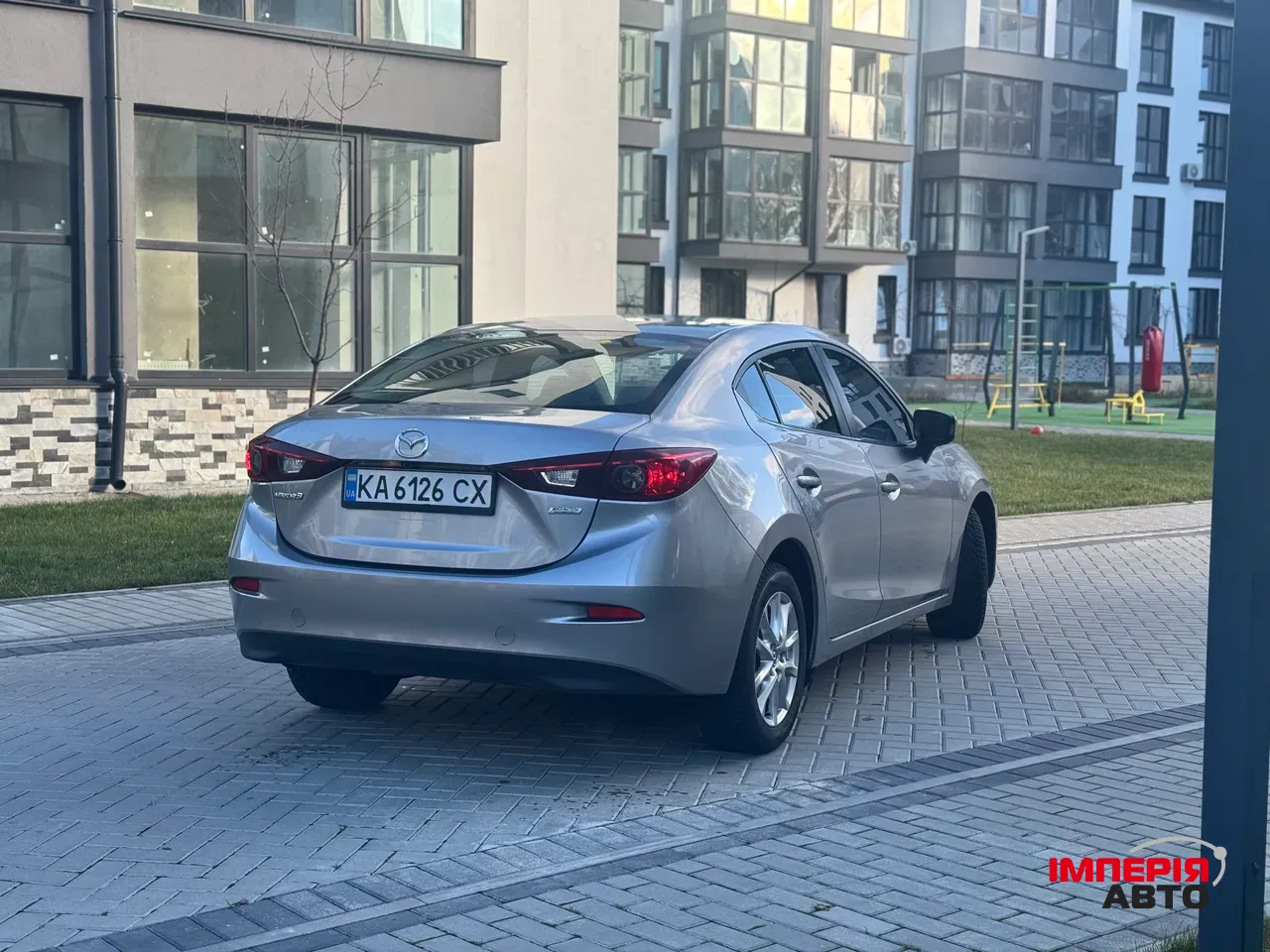 Mazda 3 - фото 4