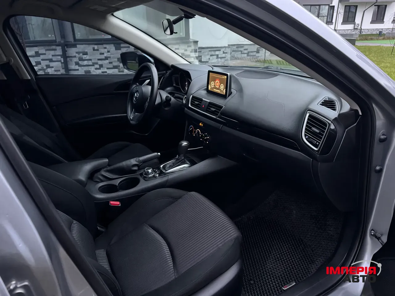 Mazda 3 - фото 11