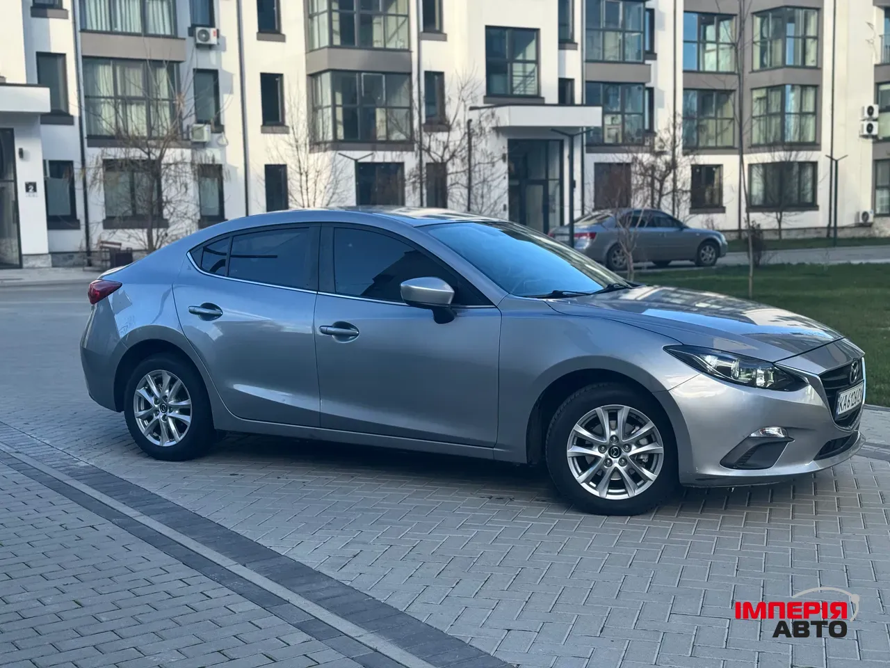 Mazda 3 - фото 2