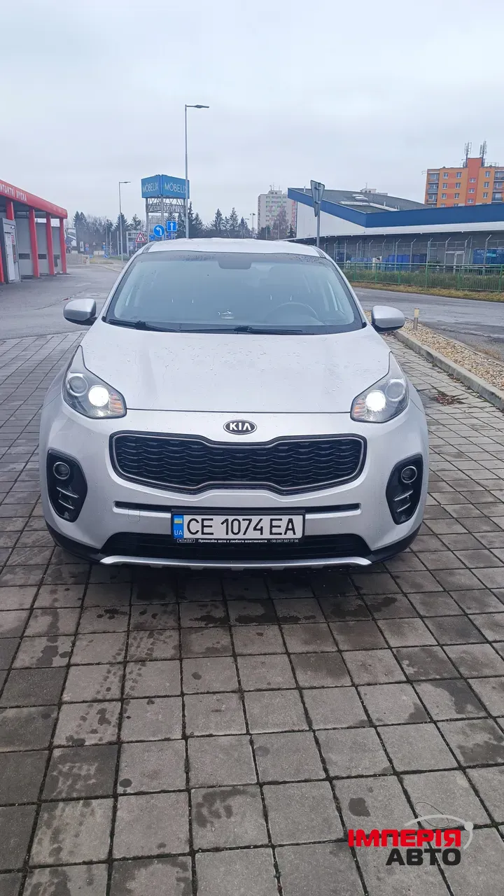 Kia Sportage - фото 1
