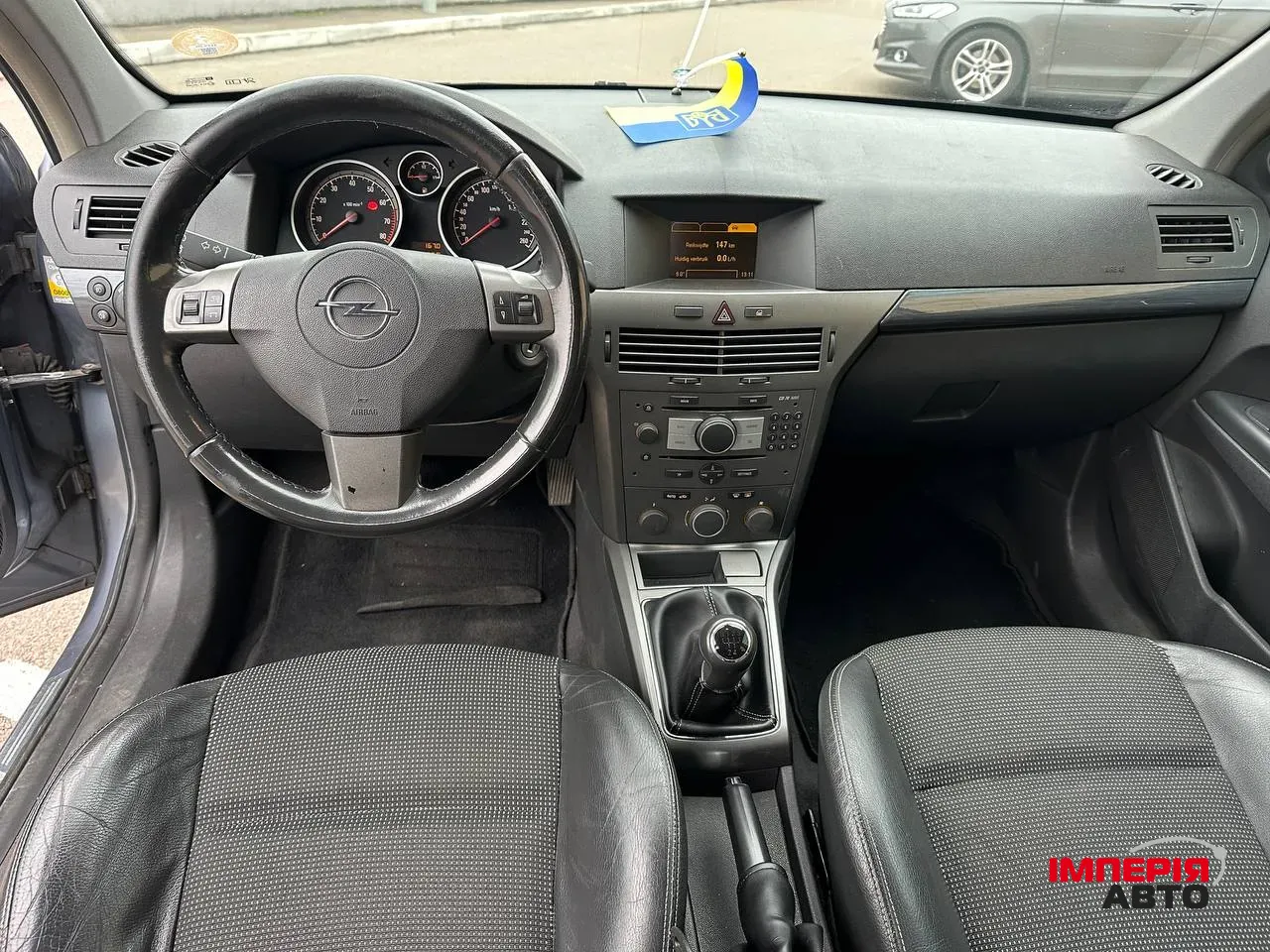 Opel Astra - фото 7