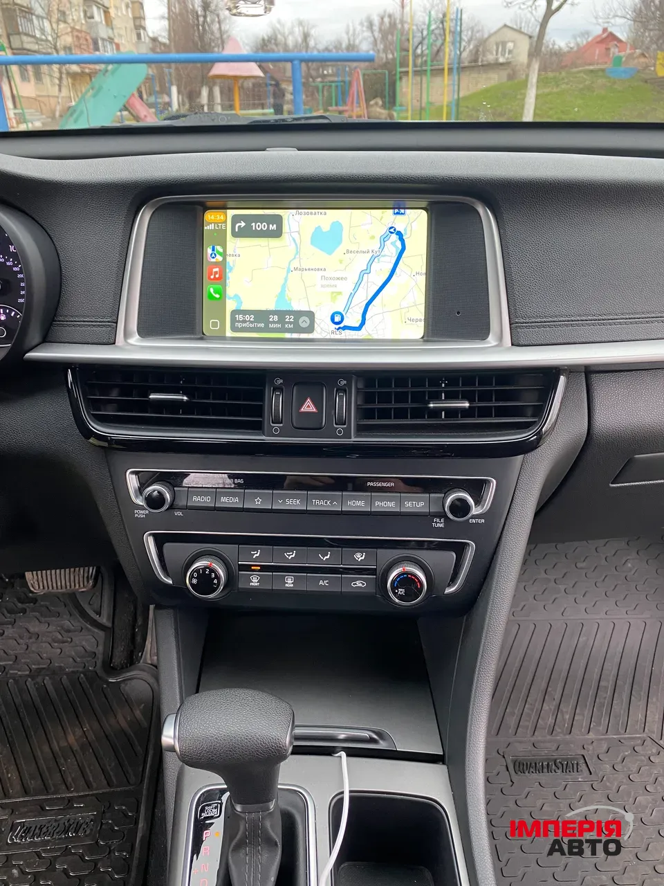 Kia Optima - фото 6