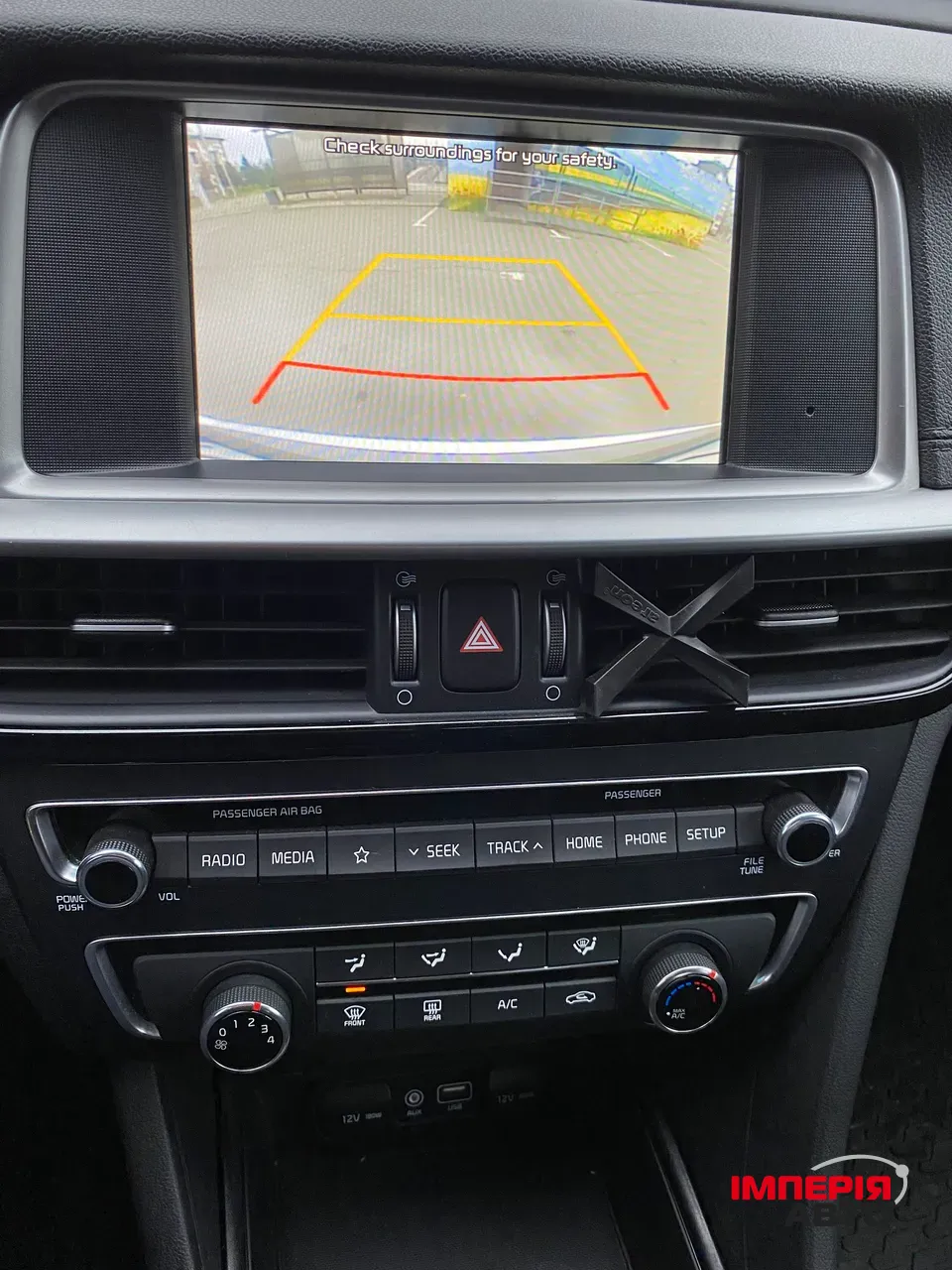 Kia Optima - фото 12