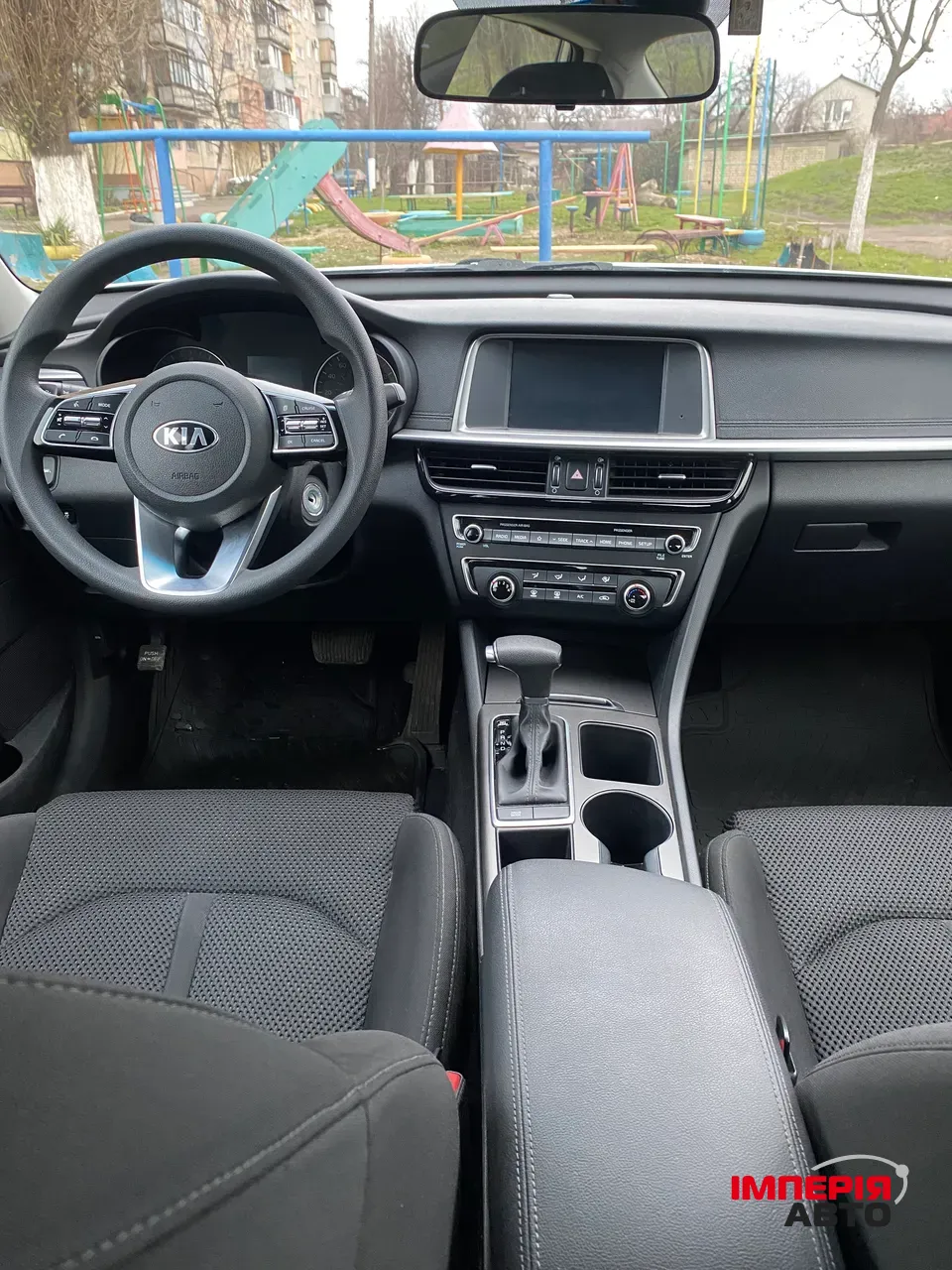 Kia Optima - фото 7