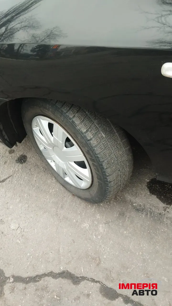 Kia Carens - фото 4