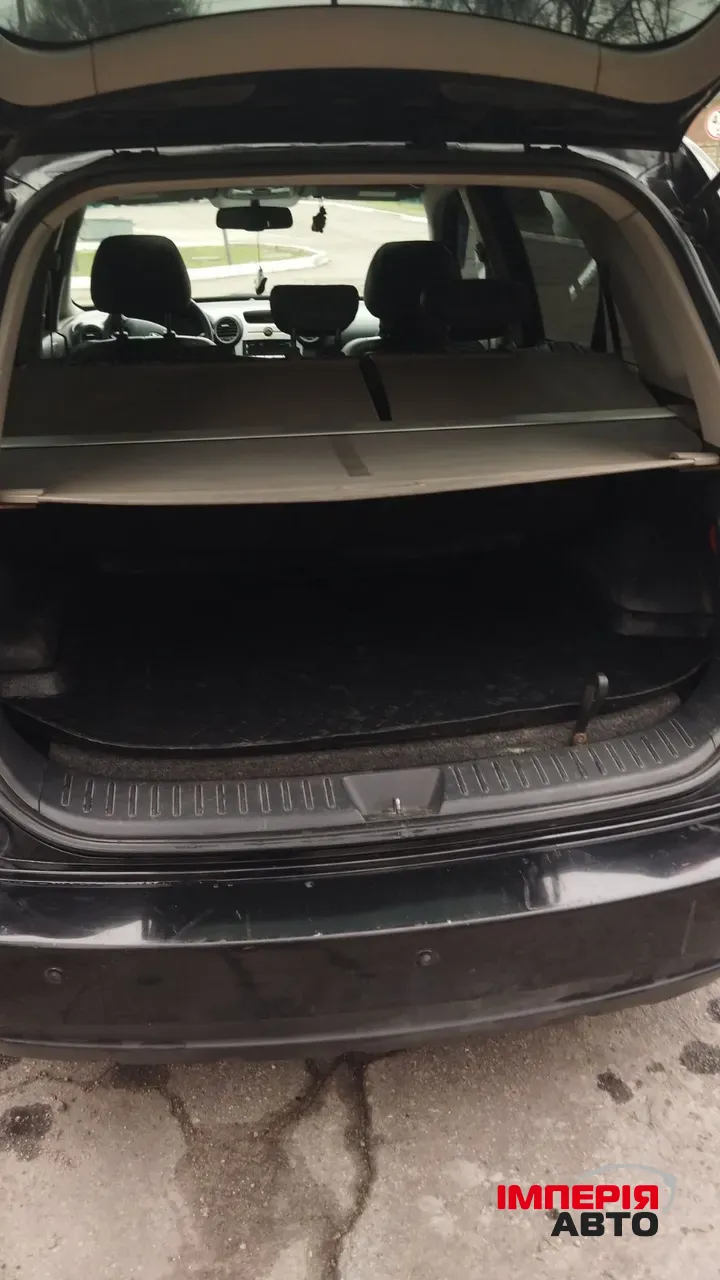 Kia Carens - фото 2