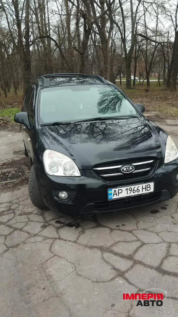 Kia Carens - фото 3