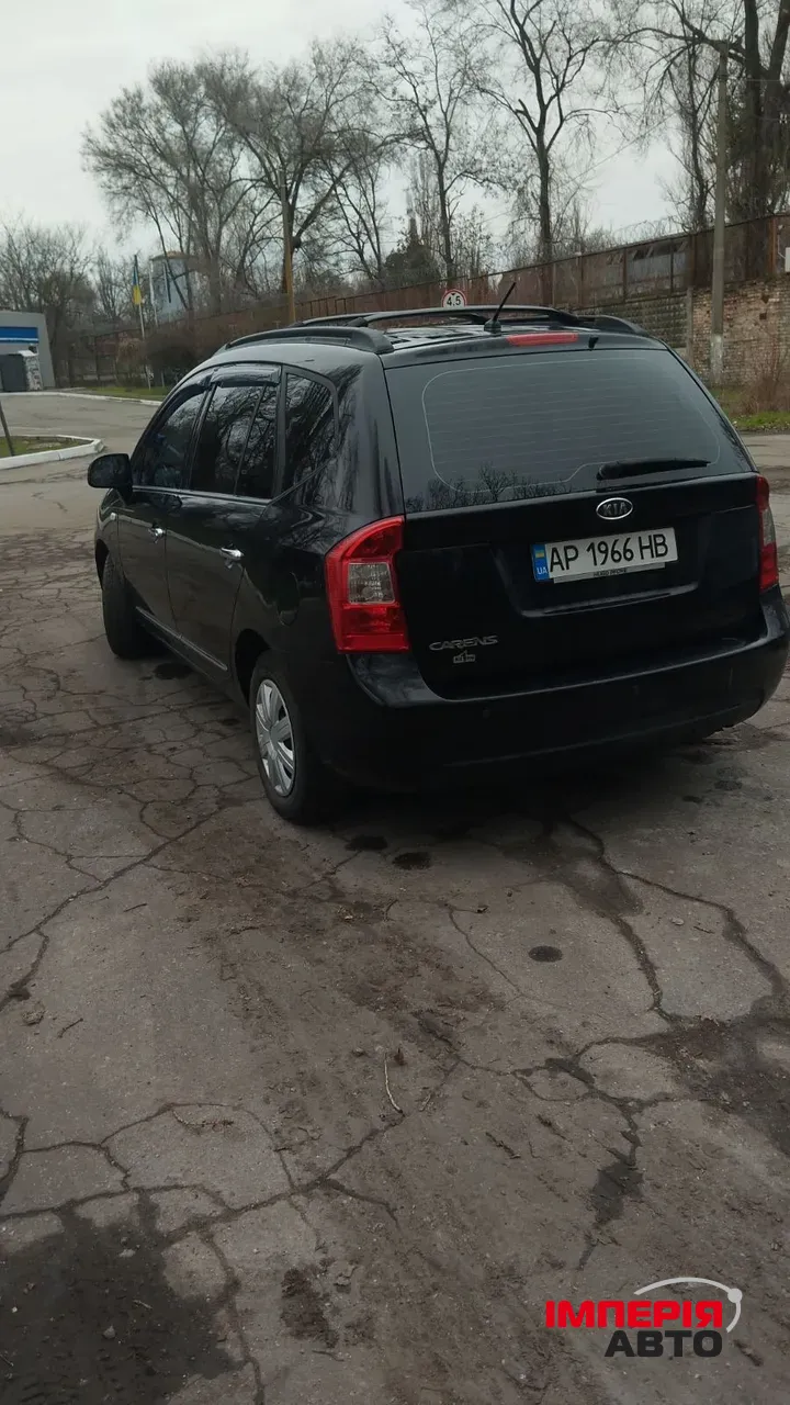 Kia Carens - фото 9